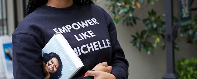 13 reader holding becoming by michelle obama